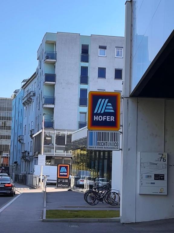 a hotel sign on the side of a building at Urban Apartment for Erasmus Student, Zentrum in Graz