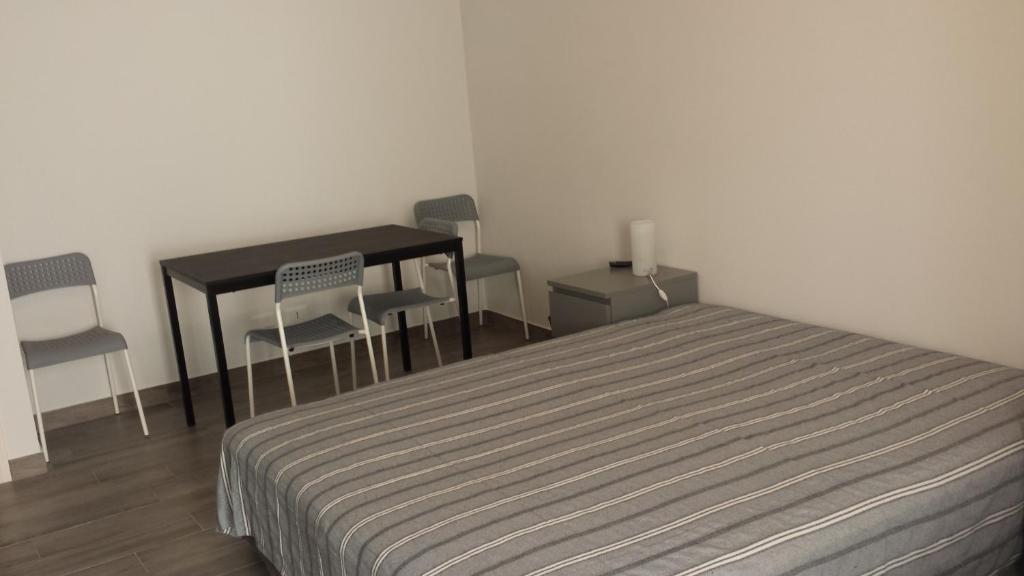 Postel nebo postele na pokoji v ubytování Beda Ragusa