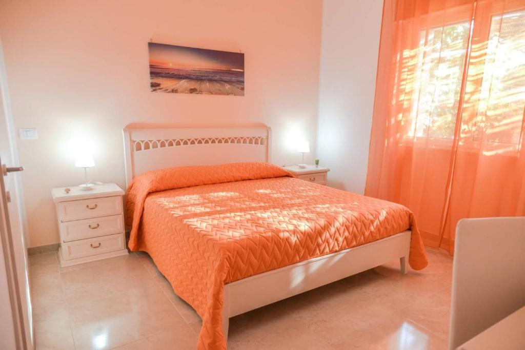 A bed or beds in a room at Villa Milla