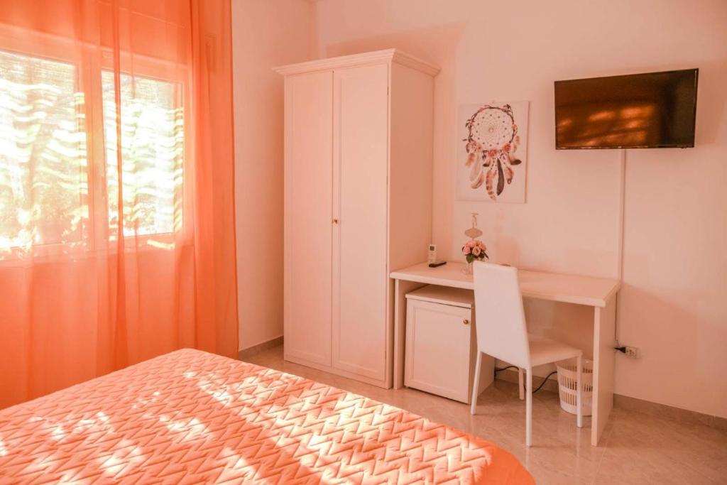 A bed or beds in a room at Villa Milla