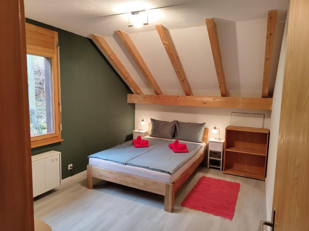 Postel nebo postele na pokoji v ubytování Traumhafte Villa Seelisberg
