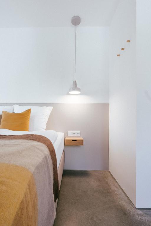 Postel nebo postele na pokoji v ubytování STADTQUARTIER Windischeschenbach