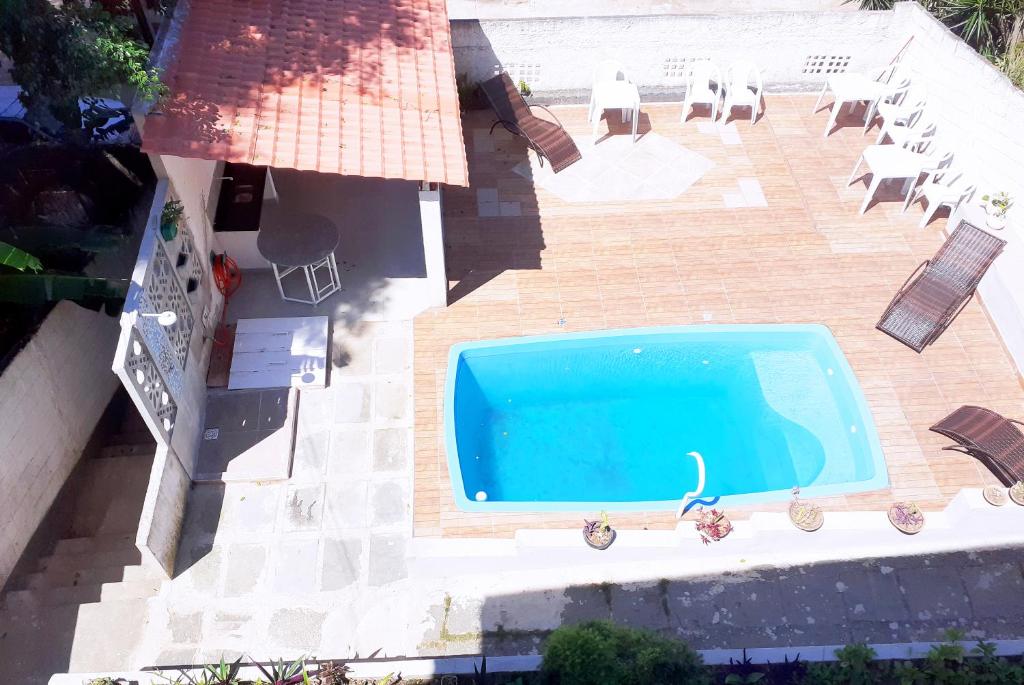 Πισίνα στο ή κοντά στο Casa na praia de Setiba com panorama fantástico