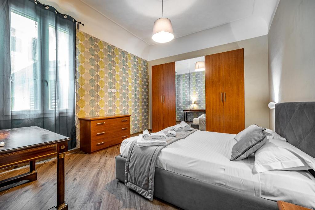 Posteľ alebo postele v izbe v ubytovaní Roommo Apartments San Gallo