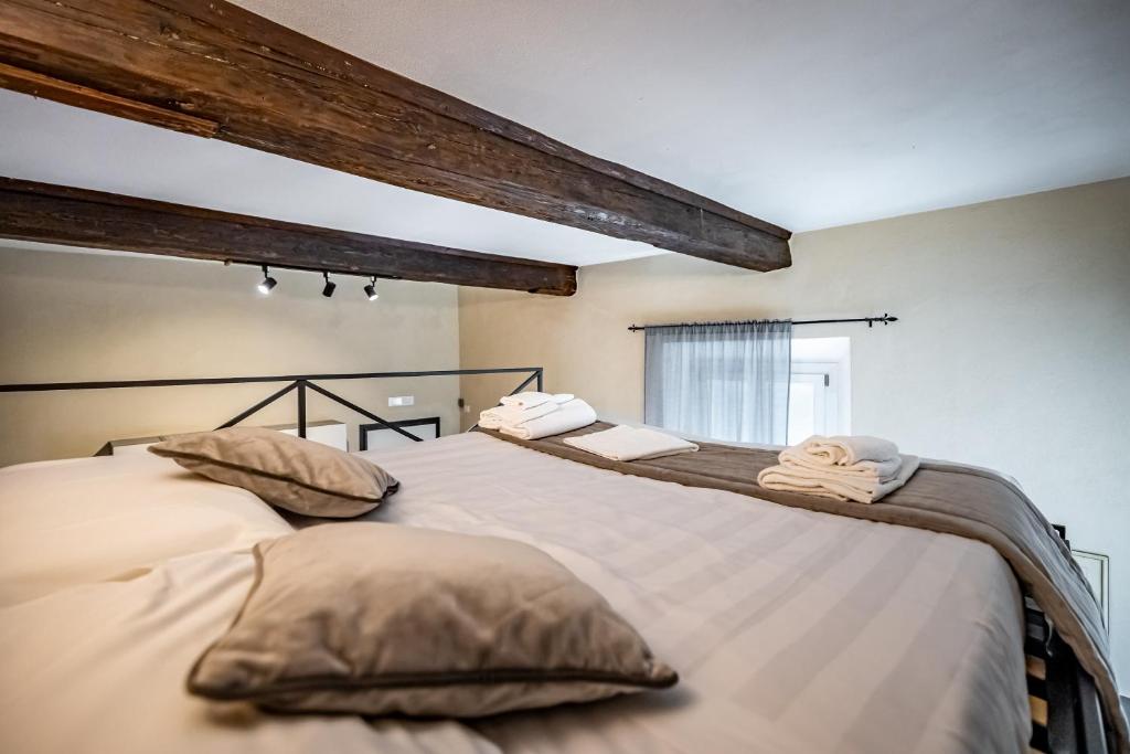 Posteľ alebo postele v izbe v ubytovaní Roommo Apartments San Gallo