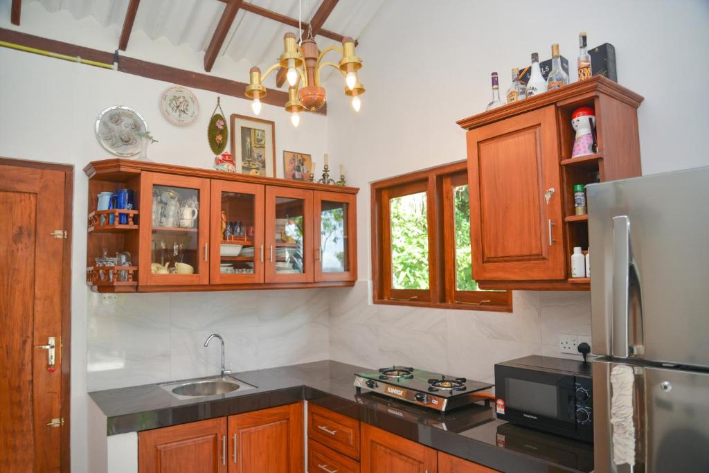 Kuchyň nebo kuchyňský kout v ubytování Villa Methsandi