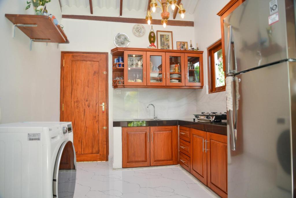 Kuchyň nebo kuchyňský kout v ubytování Villa Methsandi