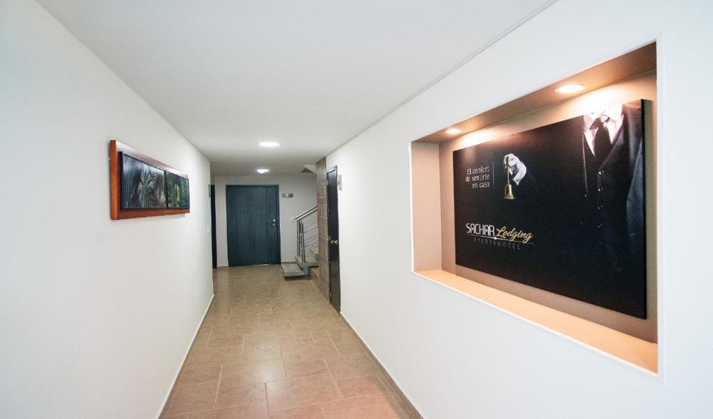 TV o dispositivi per l'intrattenimento presso Sachar Lodging Apartahotel
