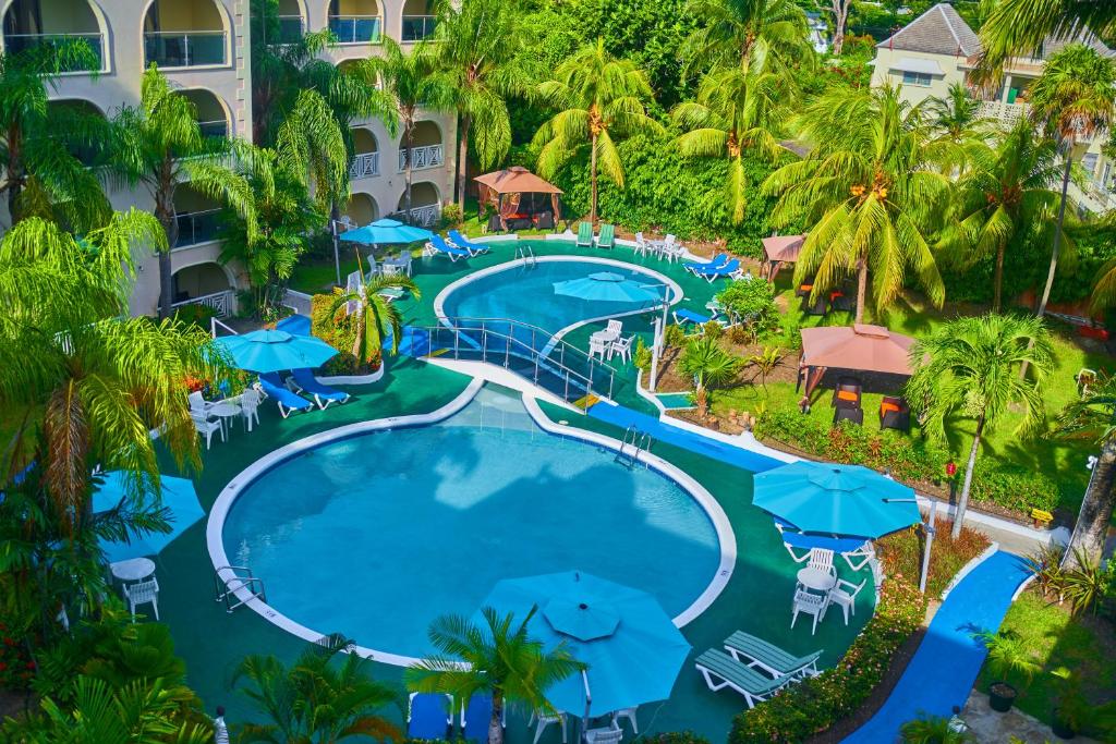 an overhead view of a swimming pool at a resort at Sunbay Hotel in Christ Church