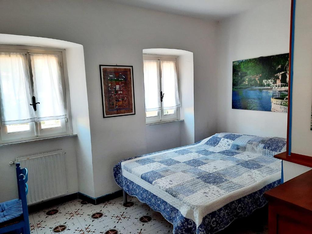 Posteľ alebo postele v izbe v ubytovaní La Casa nel Borgo