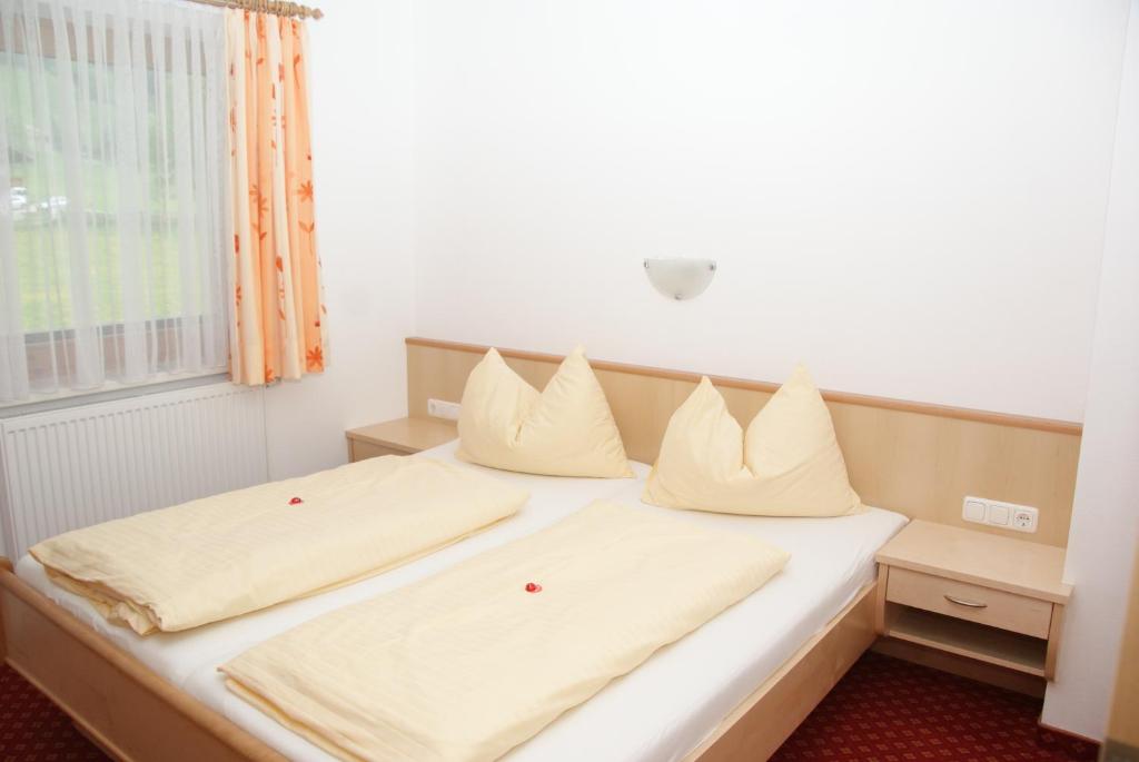 Postel nebo postele na pokoji v ubytování Landhaus Rauch