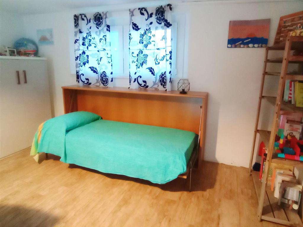Postel nebo postele na pokoji v ubytování Valle Rubicone
