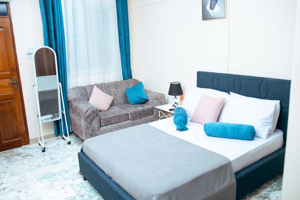 Postel nebo postele na pokoji v ubytování Semo's apartment