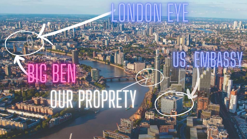 una vista de una ciudad con las palabras London ojo nosotros embajada y nuestra prioridad en St, George Wharf Vauxhall Bridge large 2Bedrooms apartment with River View panoramic balcony, en Londres