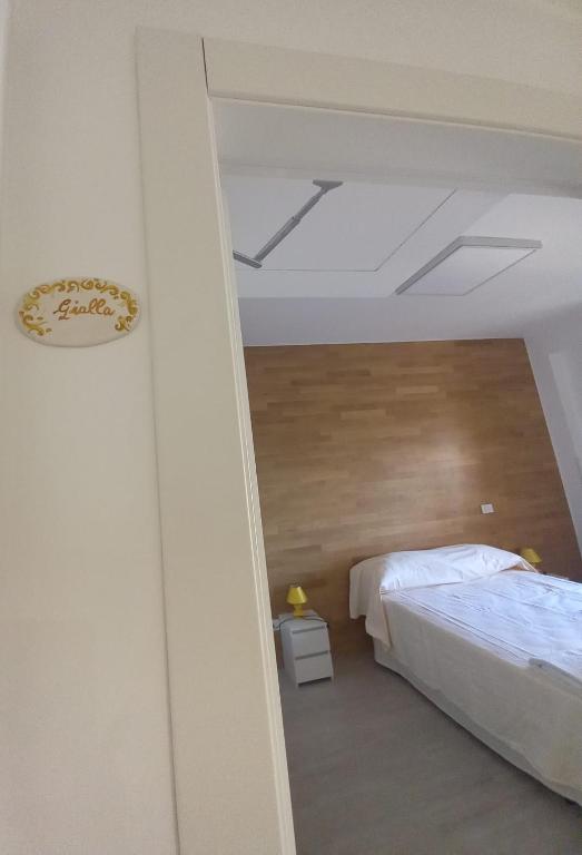 Postel nebo postele na pokoji v ubytování L'Attico di Matilde