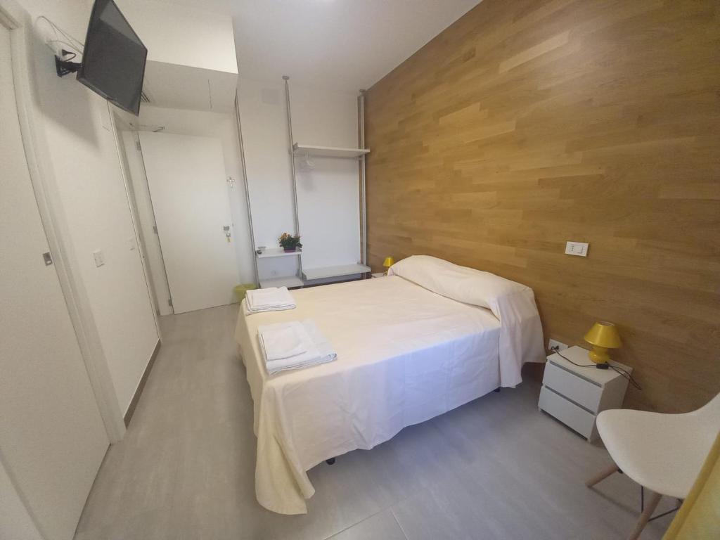 Postel nebo postele na pokoji v ubytování L'Attico di Matilde