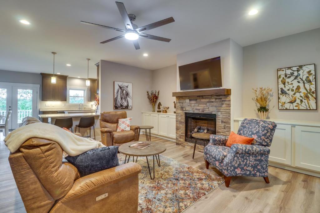 a living room with furniture and a fireplace at Secluded Barboursville Home with Covered Porch! in Barboursville