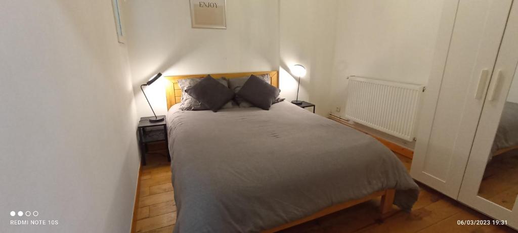 Posteľ alebo postele v izbe v ubytovaní Superbe appart cosy, bien situé avec une chambre