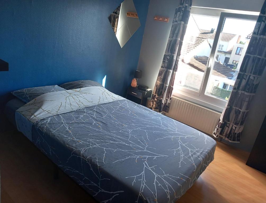 Posteľ alebo postele v izbe v ubytovaní Le Petit Prince
