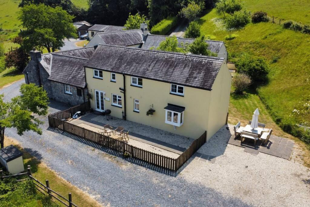 an aerial view of a house with a patio at Meadowsweet Cottage Jacuzzi Edition in Saundersfoot