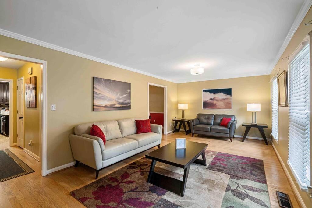 a living room with a couch and a table at Townhouse in Marietta in Marietta