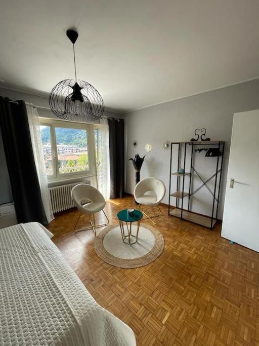 Postel nebo postele na pokoji v ubytování Charming Penthouse near Como lake