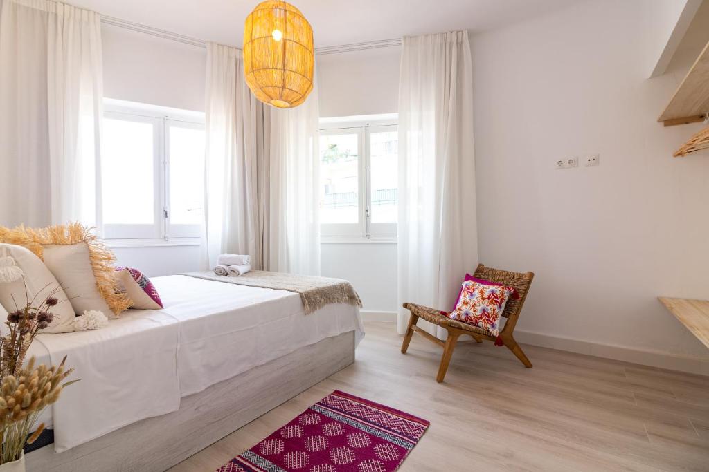 Posteľ alebo postele v izbe v ubytovaní Malaga Center Flat Holidays City Center
