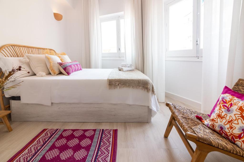 Posteľ alebo postele v izbe v ubytovaní Malaga Center Flat Holidays City Center