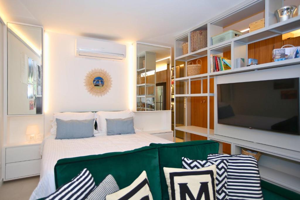 Unhotel - Bossa Design Studios Ipanema, Perto da Praiaにあるテレビまたはエンターテインメントセンター