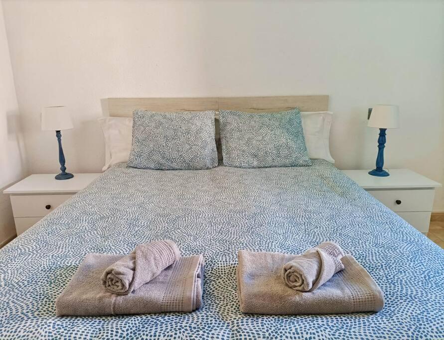 Postel nebo postele na pokoji v ubytování Suite Villa Rucaba Las Américas con Piscina