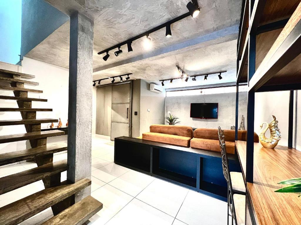 TV a/nebo společenská místnost v ubytování Casa com Piscina e churrasqueira 5 min do Centro