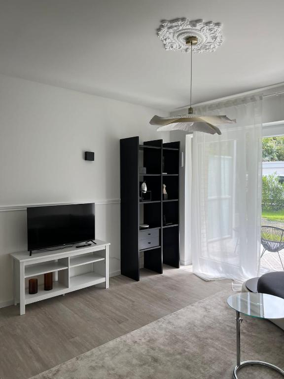 TV a/nebo společenská místnost v ubytování Paris to Bochum, 4 Pers. Apartm.
