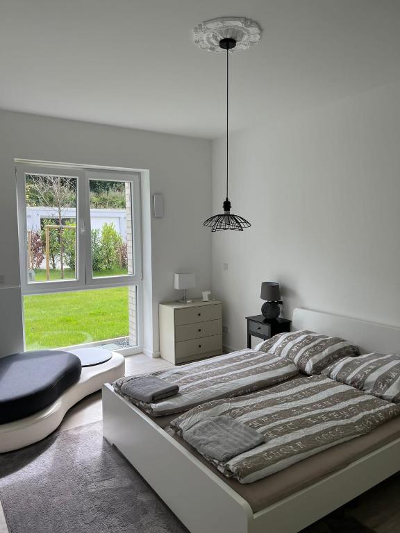 Postel nebo postele na pokoji v ubytování Paris to Bochum, 4 Pers. Apartm.