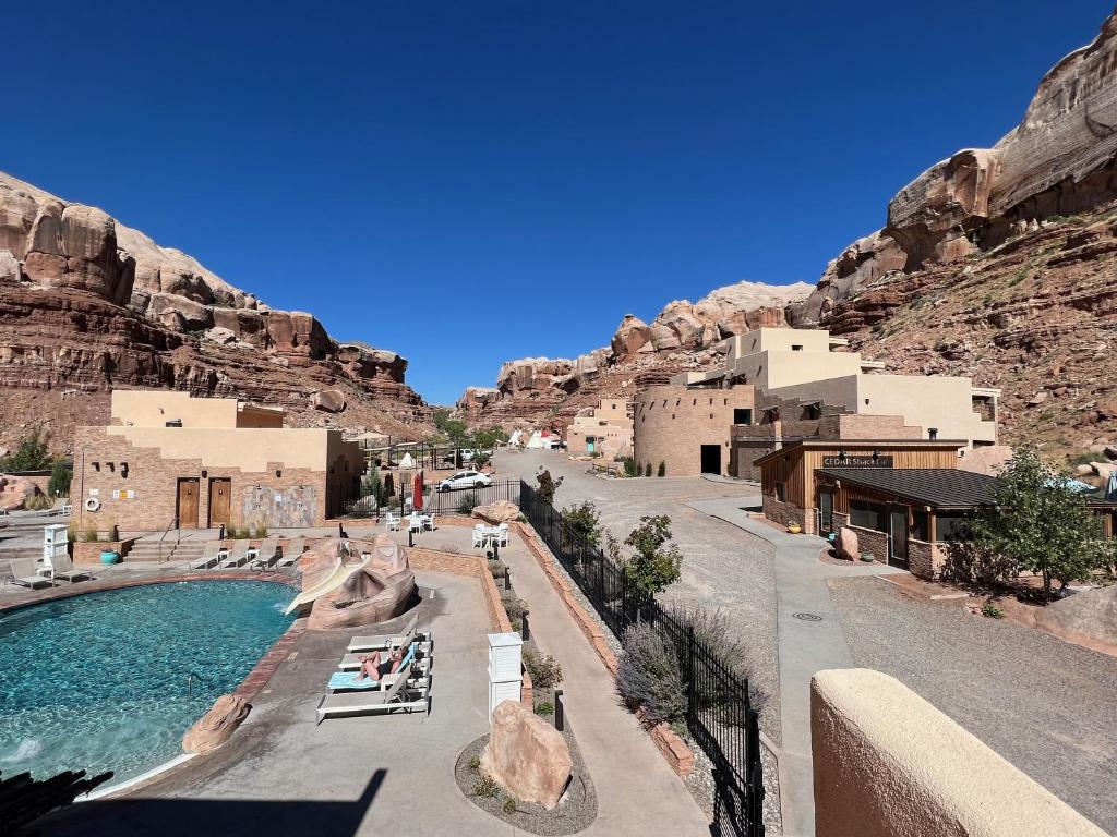 a view of a resort with a swimming pool at Bluff Dwellings Resort in Bluff