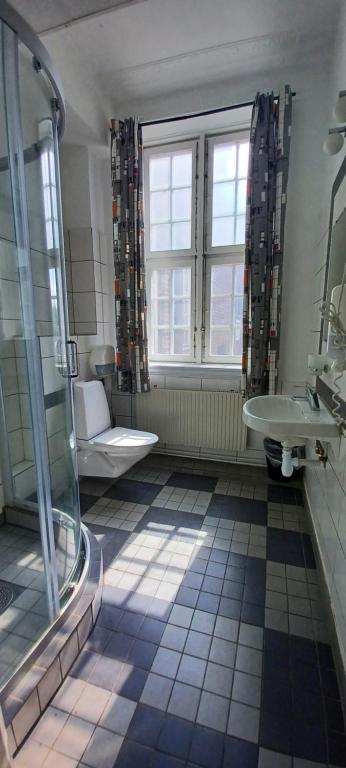Koupelna v ubytování Halmstad Hotell & Vandrarhem Kaptenshamn