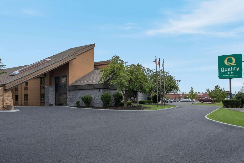 a building with a sign in front of it at Quality Inn in Toledo