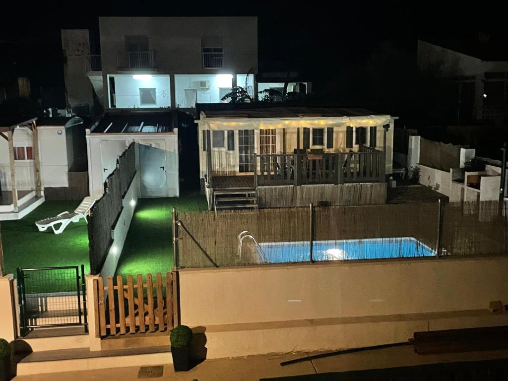 Bazén v ubytovaní Chalet-home familiar "CAL ÍNDIA" "Pet friendly" alebo v jeho blízkosti