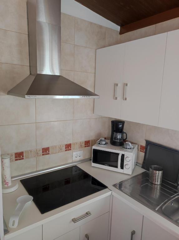 Kuchyň nebo kuchyňský kout v ubytování CASA DONELA
