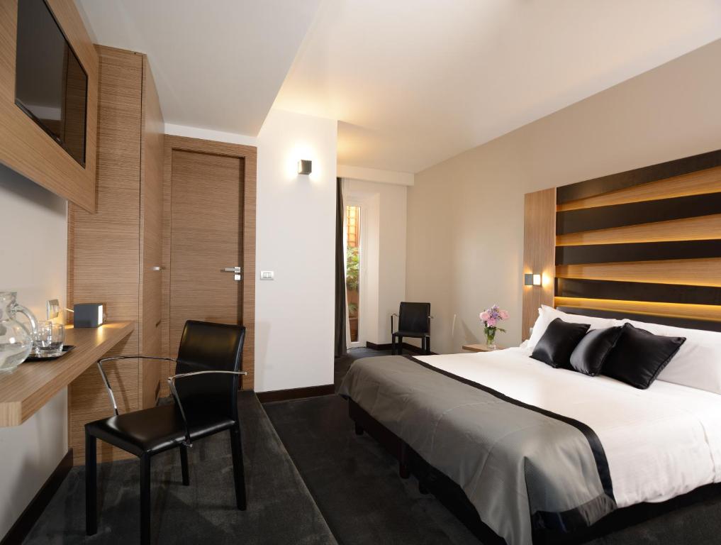 Postel nebo postele na pokoji v ubytování Hotel Trevi - Gruppo Trevi Hotels