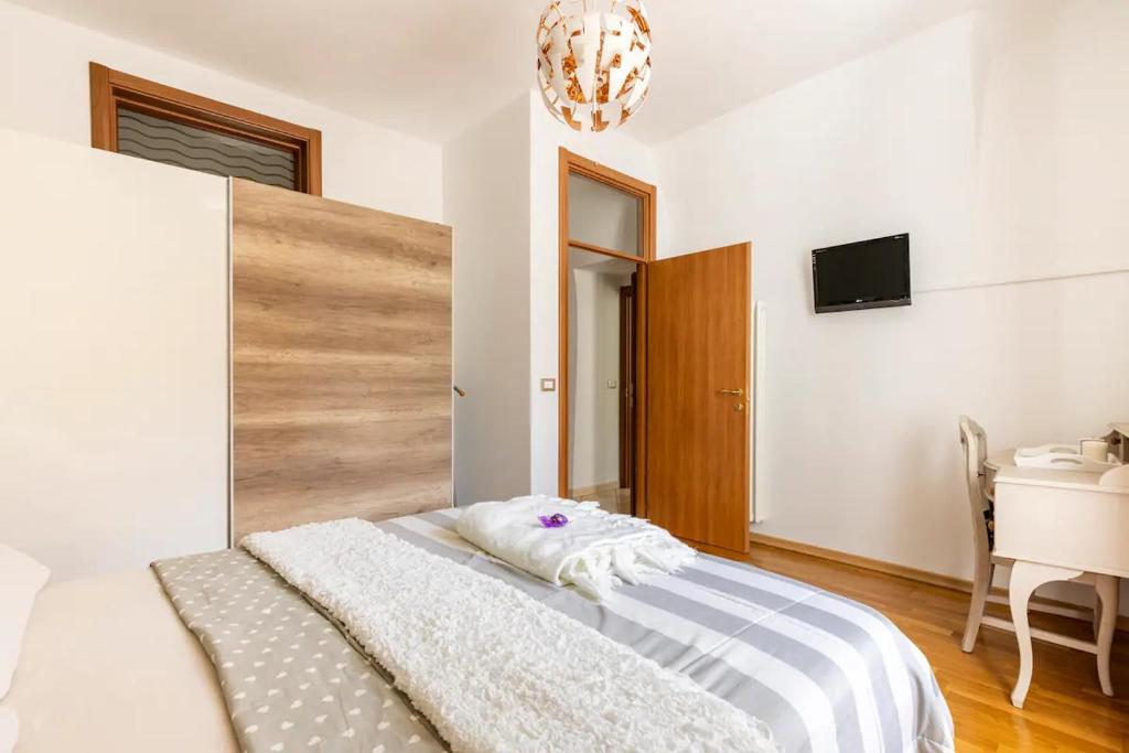 Postel nebo postele na pokoji v ubytování Piccola Venezia - Borgo Valsugana