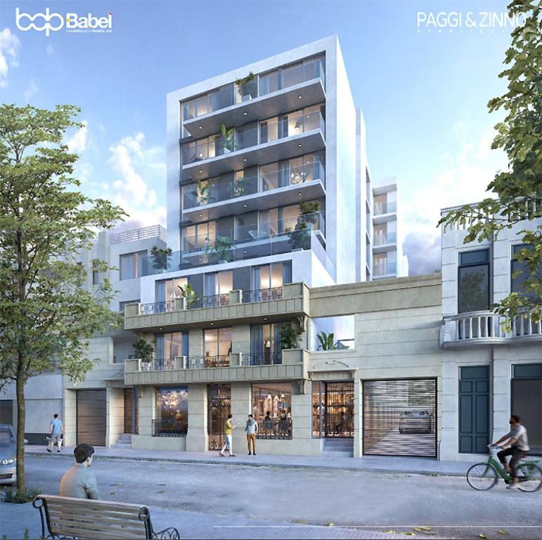 a rendering of a building with people in front of it at Apartamento céntrico en Mercedes Uruguay in Mercedes