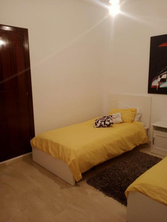 Postel nebo postele na pokoji v ubytování Bel appartement à skhirat plage et à 20 mn de Rabat