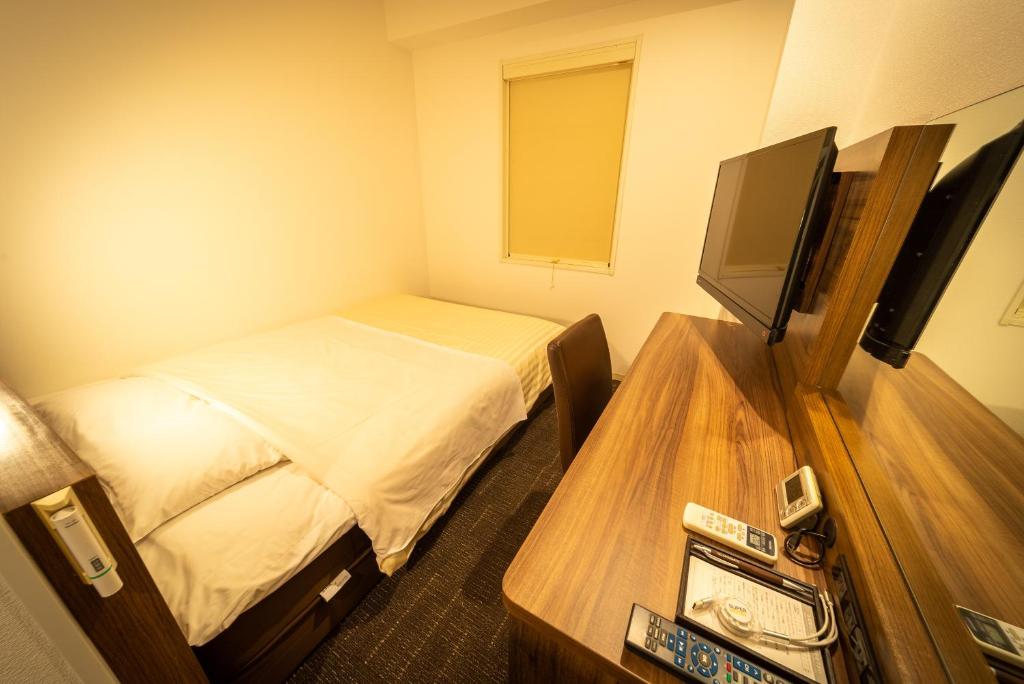 TV a/nebo společenská místnost v ubytování Super Hotel Tokyo JR Tachikawa Kitaguchi