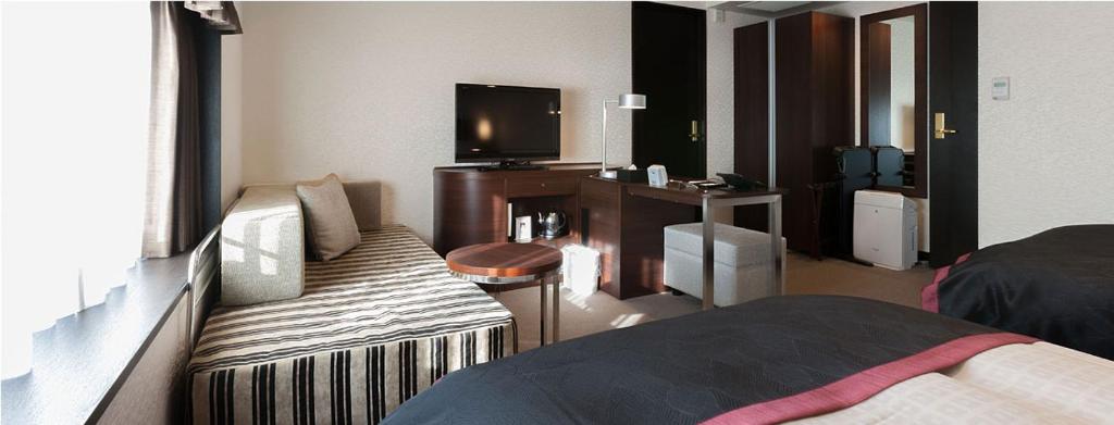 TV a/nebo společenská místnost v ubytování Onomichi Kokusai Hotel