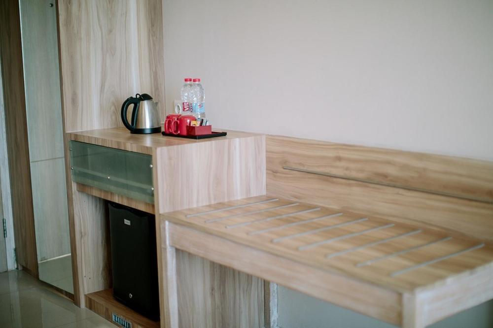 Kuchyň nebo kuchyňský kout v ubytování Mahogany Hotel