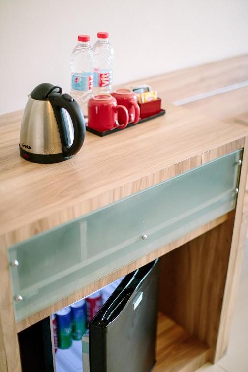 Kuchyň nebo kuchyňský kout v ubytování Mahogany Hotel