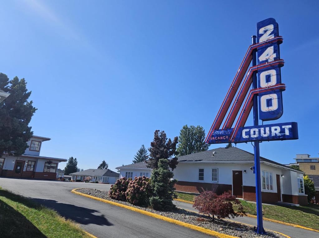 a sign for a court motel on a street at 2400 Motel in Vancouver