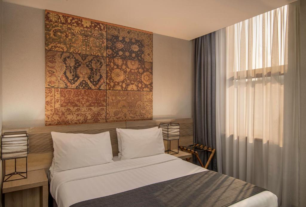 Postel nebo postele na pokoji v ubytování Republica Hotel Yerevan