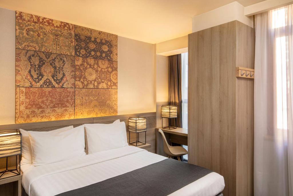Postel nebo postele na pokoji v ubytování Republica Hotel Yerevan