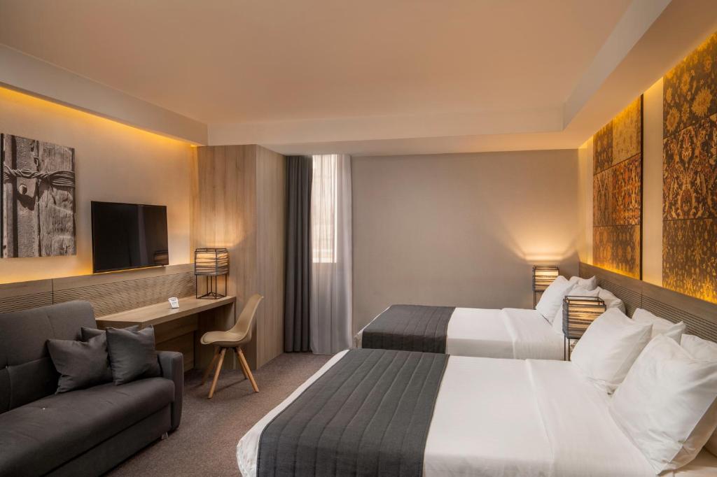 Postel nebo postele na pokoji v ubytování Republica Hotel Yerevan